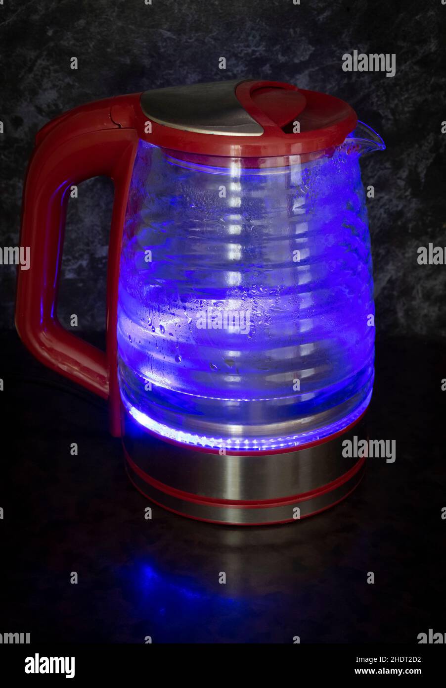 Glass electric kettle with blue LED lighting closeup Stock Photo Alamy