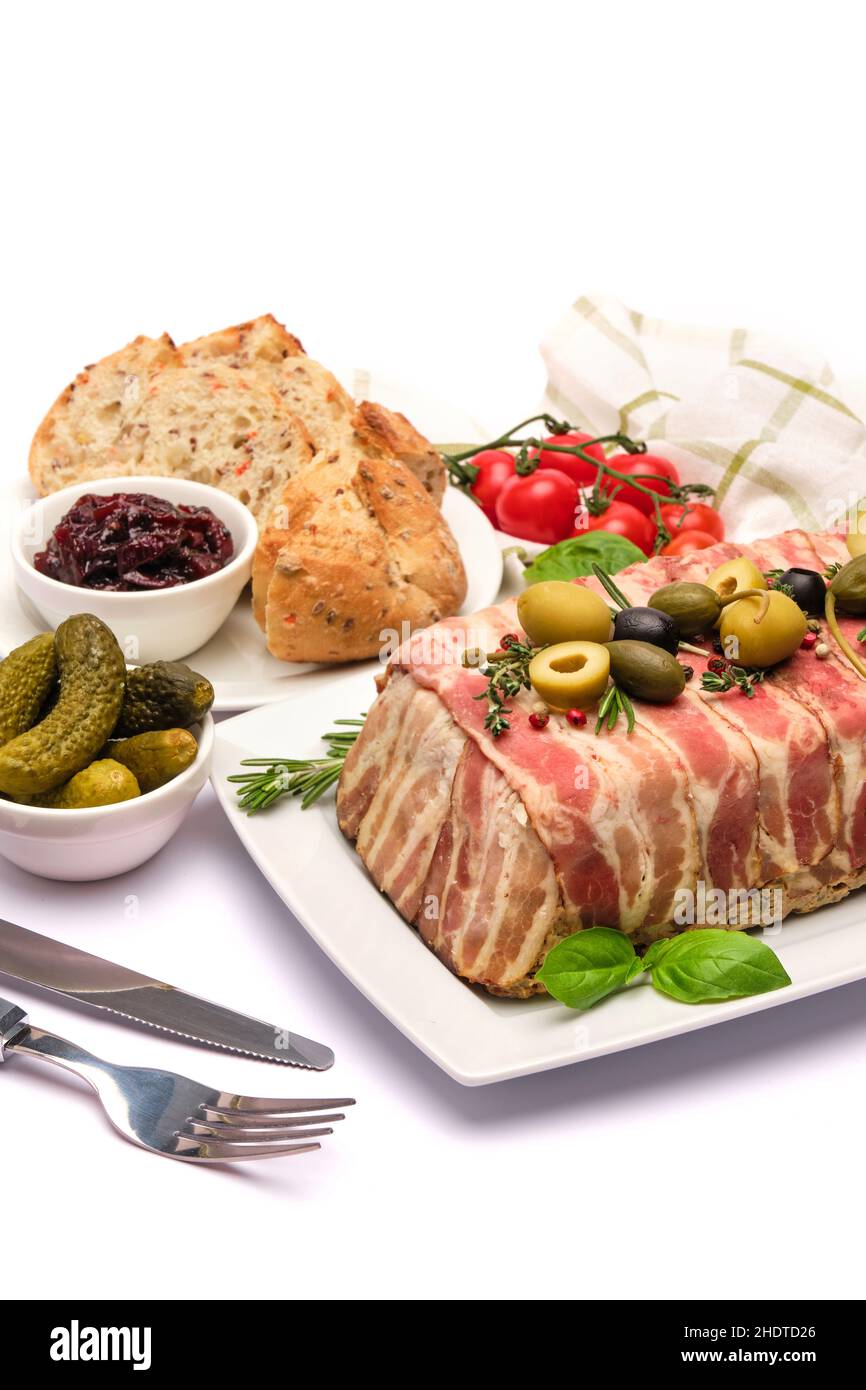 Traditional French terrine covered with bacon isolated on white background Stock Photo Alamy