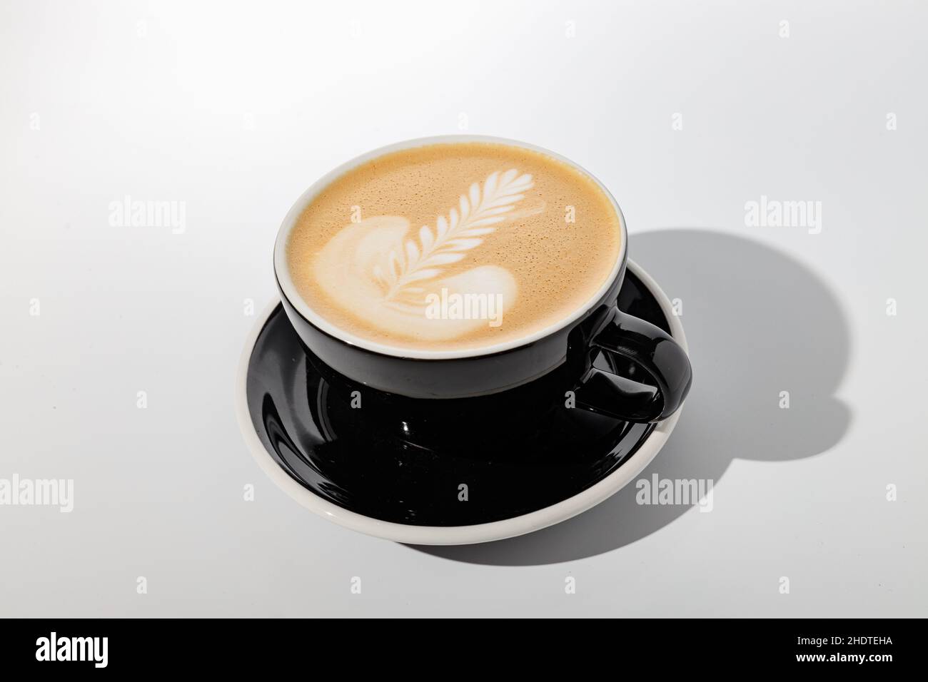 Espresso based coffee drink with addition of warmed milk Stock Photo