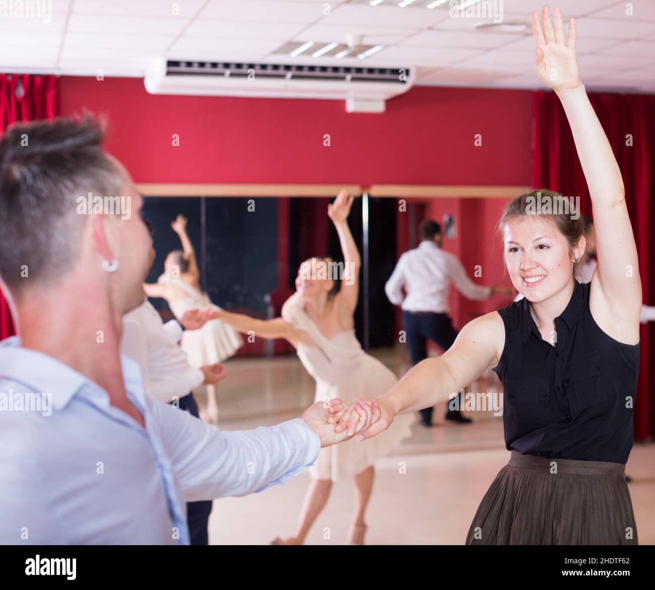 People practicing lindy hop movements Stock Photo