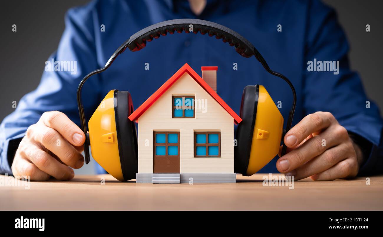 House Loud Noise Protection. Construction Sound Protection Stock Photo