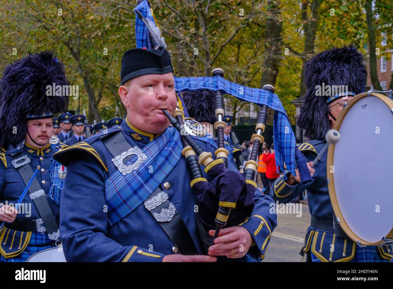 Close up of man playing bagpipes for Royal Air Force Pipes & Drums
