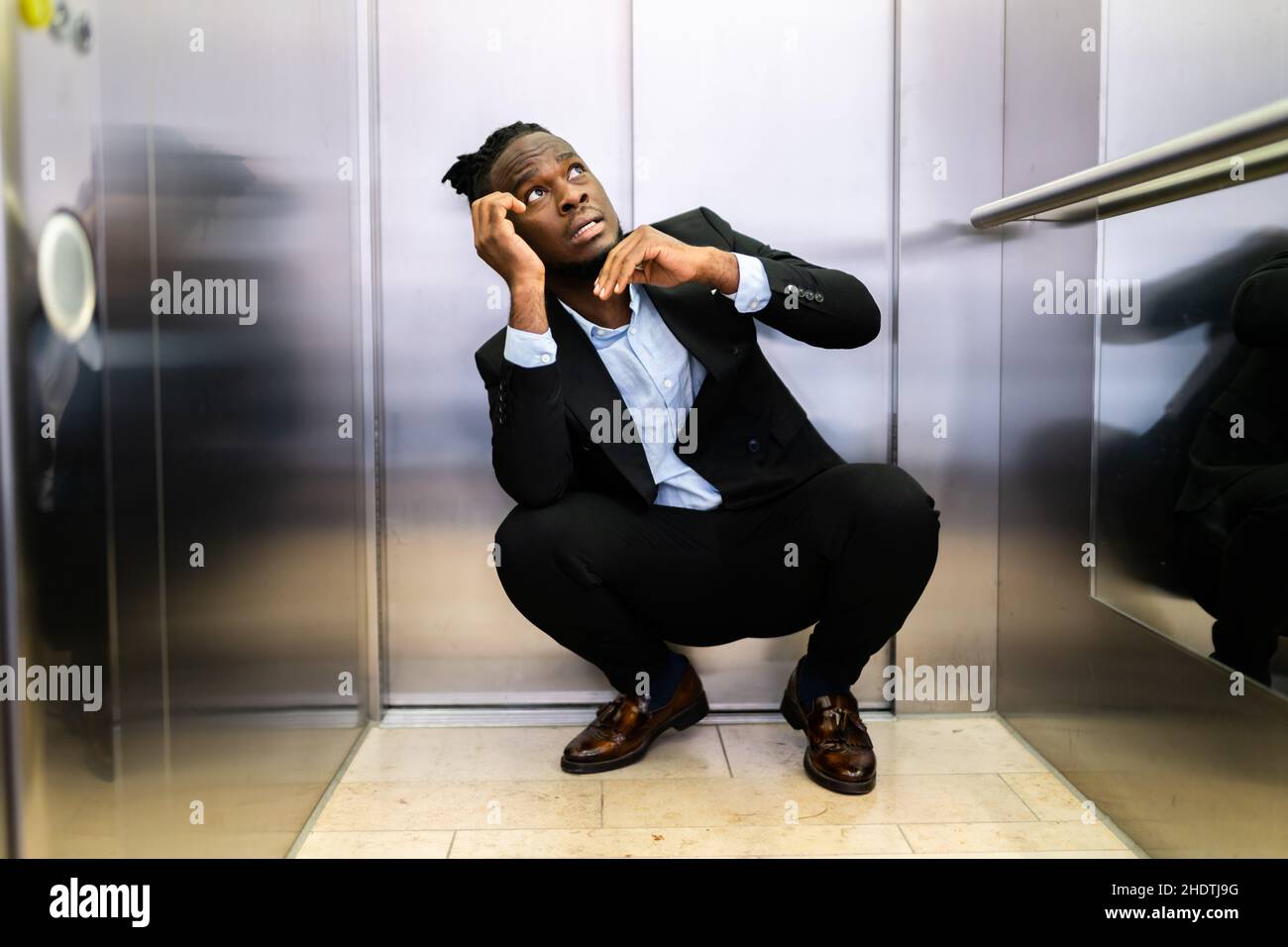 Trapped Or Stuck Inside Elevator. Fear And Agoraphobia Stock Photo
