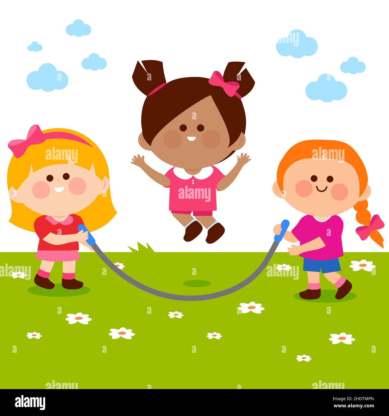 Happy children skipping rope and playing Stock Photo - Alamy