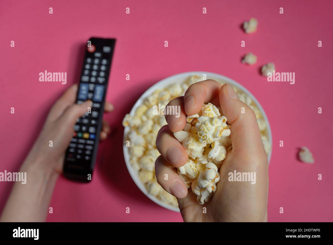 eating, watching tv, popcorn, eat, television, tv, popcorns Stock Photo