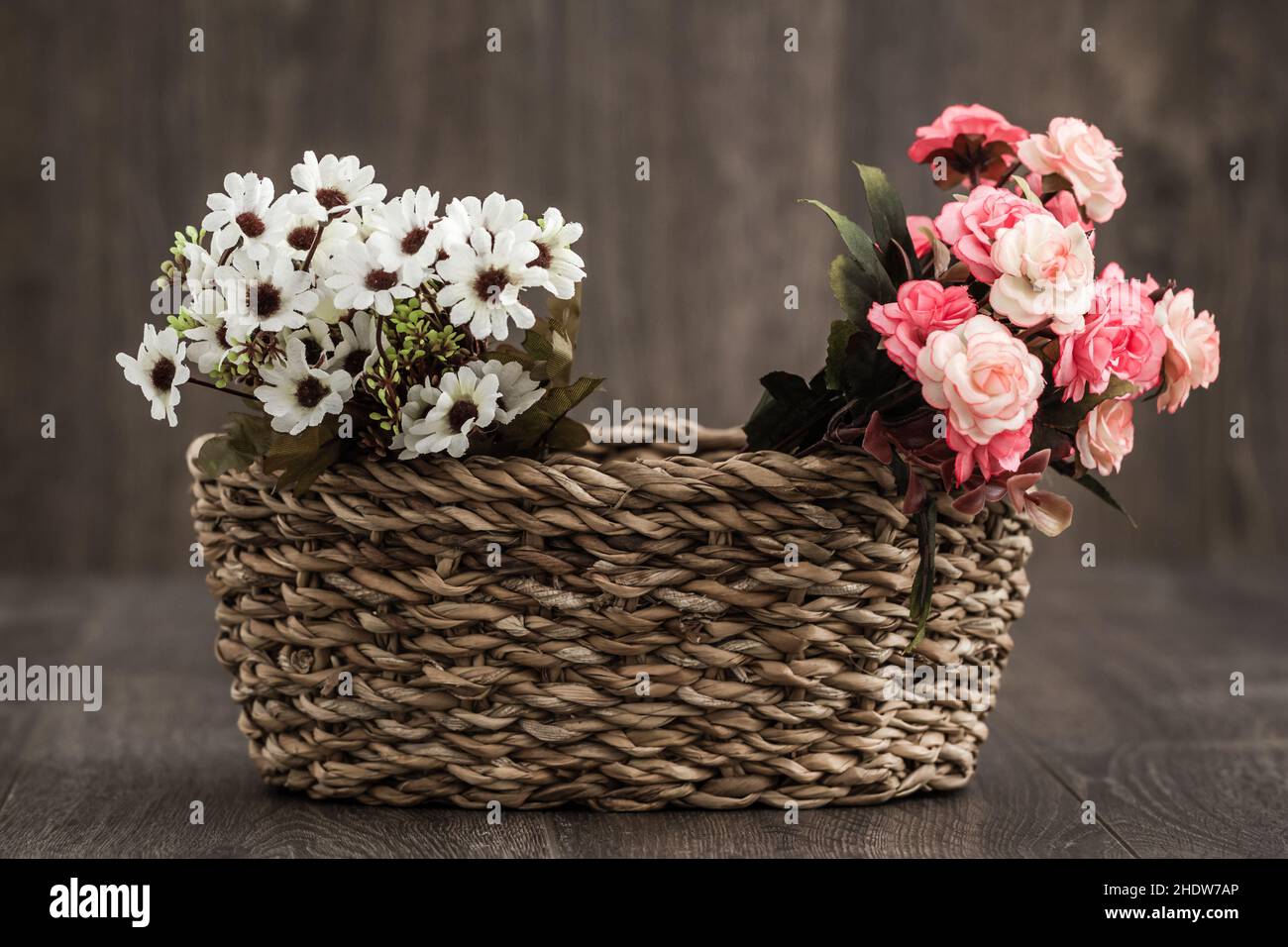 Premium Photo  Background colorful multicolored small artificial flowers  in a basket