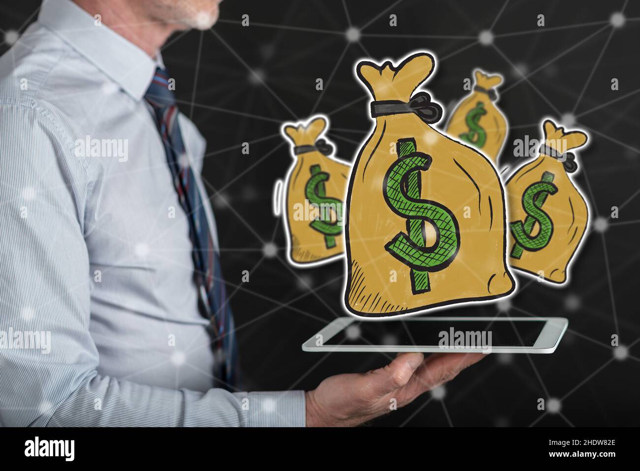 Money bag symbol been held hi-res stock photography and images - Alamy