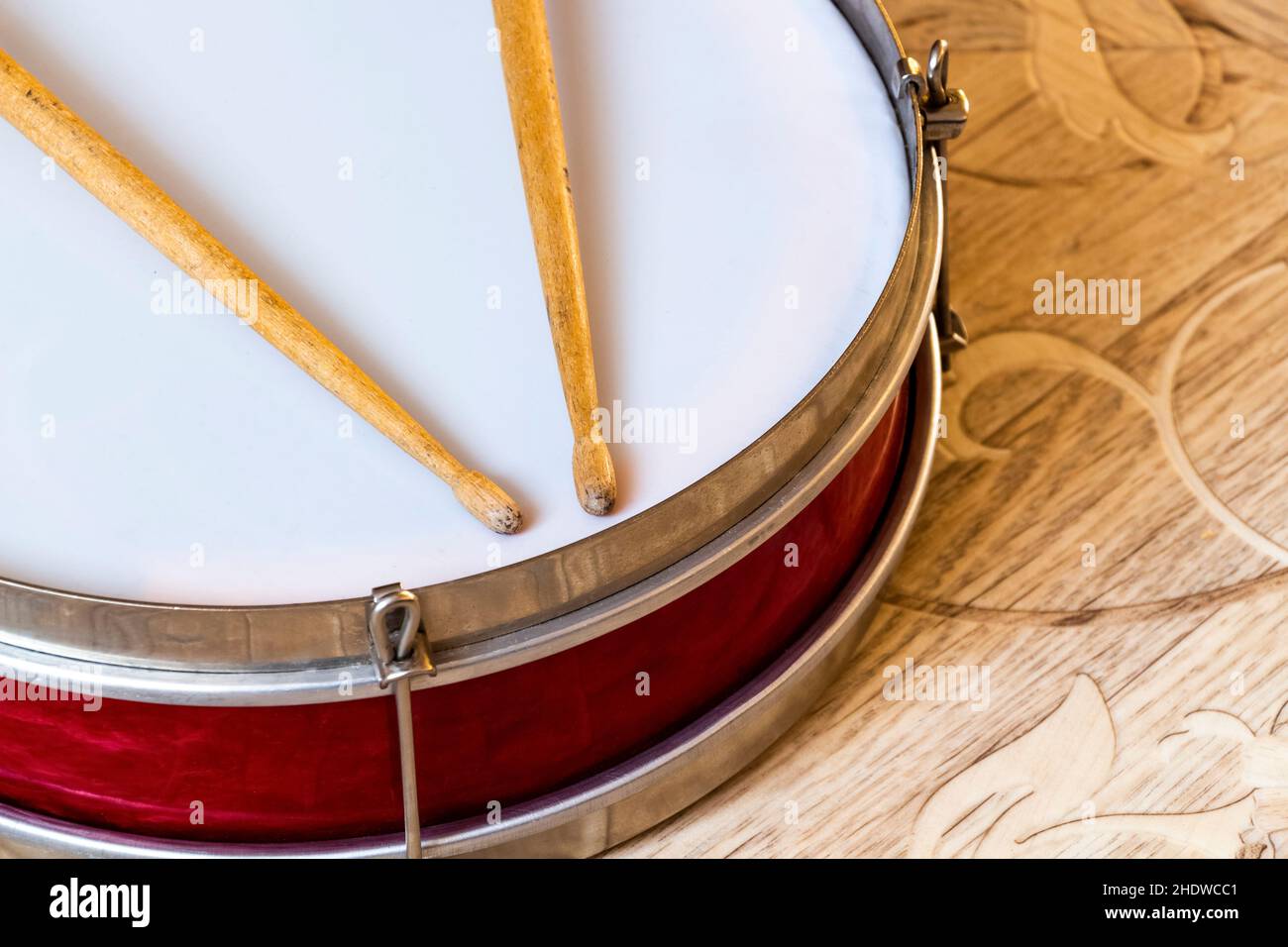 Pioneer red snare drum and wooden drumsticks Stock Photo - Alamy