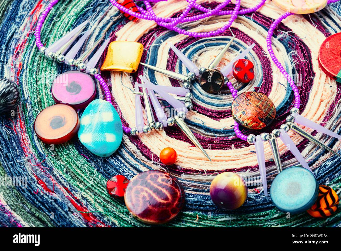 A set of bright beads of different types for needlework. Beads on a