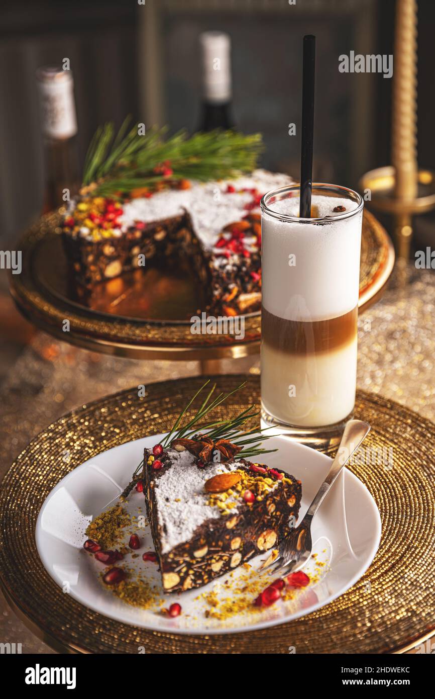 Raw vegan chocolate cake served with layered coffee Stock Photo