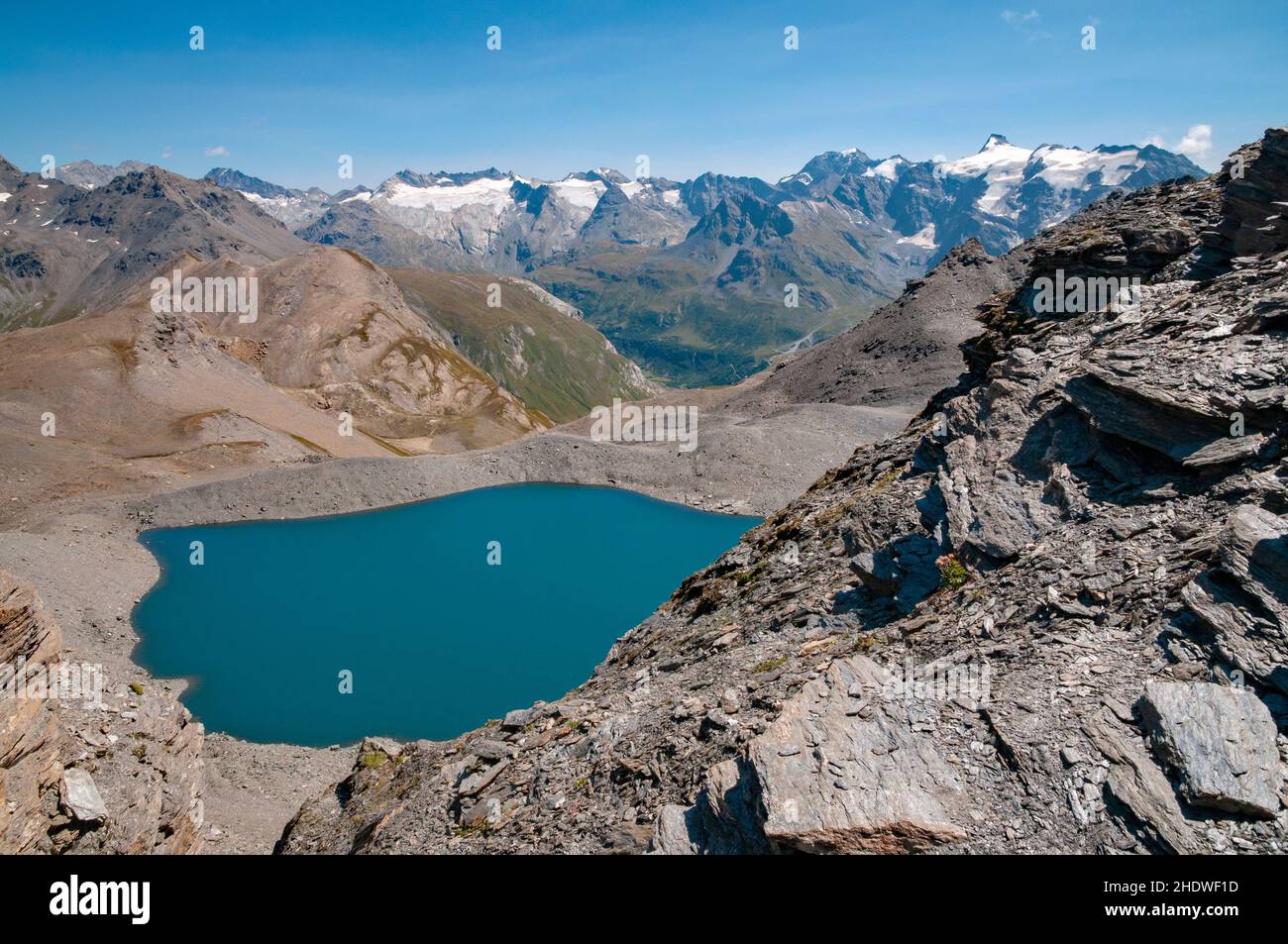 Lake of Grand Fond and the Albaron summit (3637m) in the background from Pointe des Fours (3072m), Haute-Maurienne, Vanoise massif, Bonneval-sur-Arc, Stock Photo