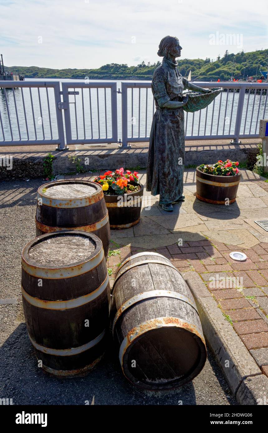 Stornoway Herring Girl - statue on seafront, Stornoway, Isle of Lewis, Outer Hebrides, Na h-Eileanan Siar, Scotland, United Kingdom - 11th of August 2 Stock Photo
