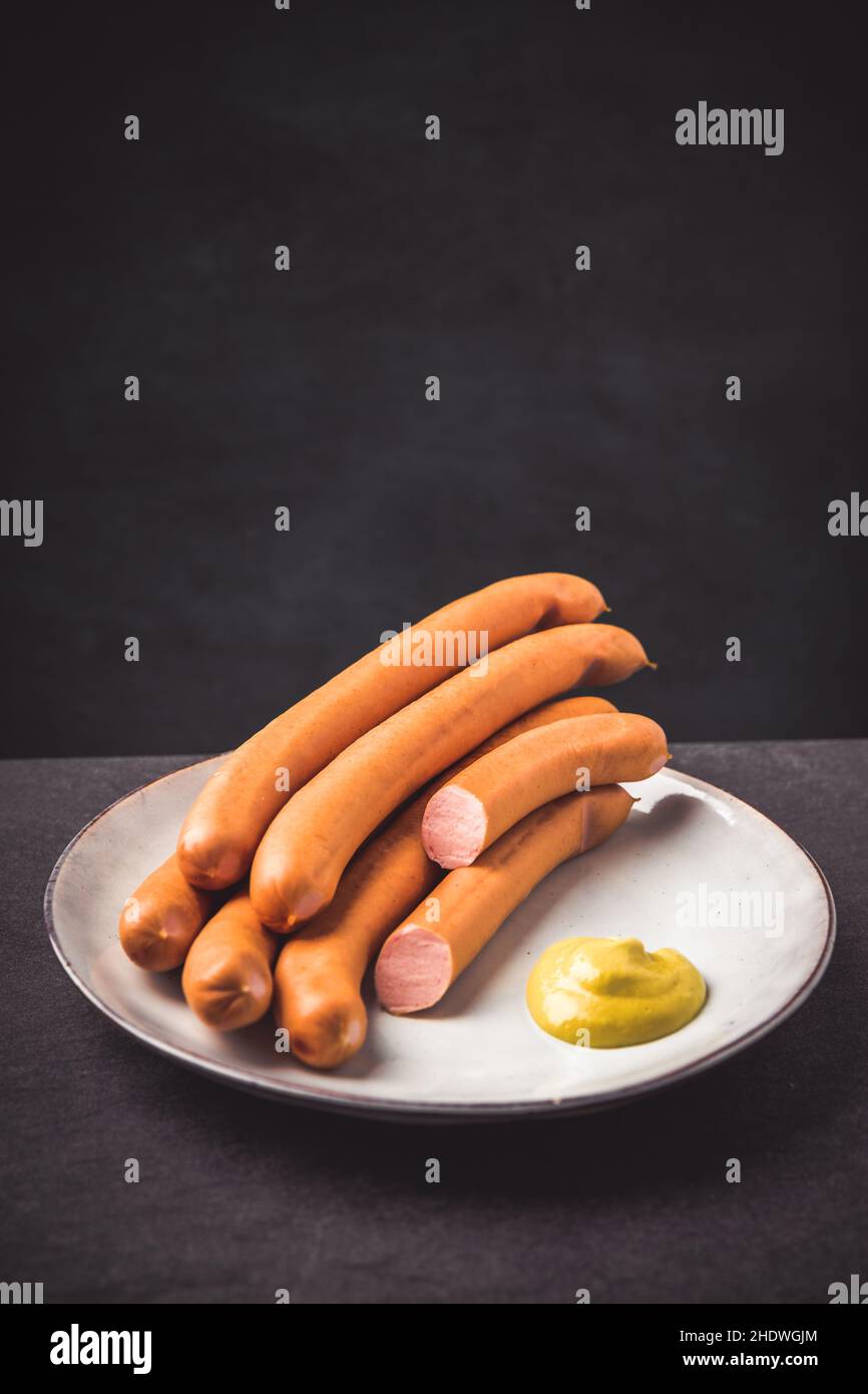 Raw Frankfurter Sausages With Mustard Stock Photo - Download Image Now - Hot  Dog, Vienna Sausage, German Culture - iStock