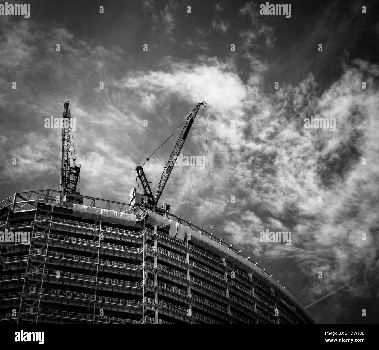 Low angle shot of new buildings being built i London, UK,  in black and white colors Stock Photo