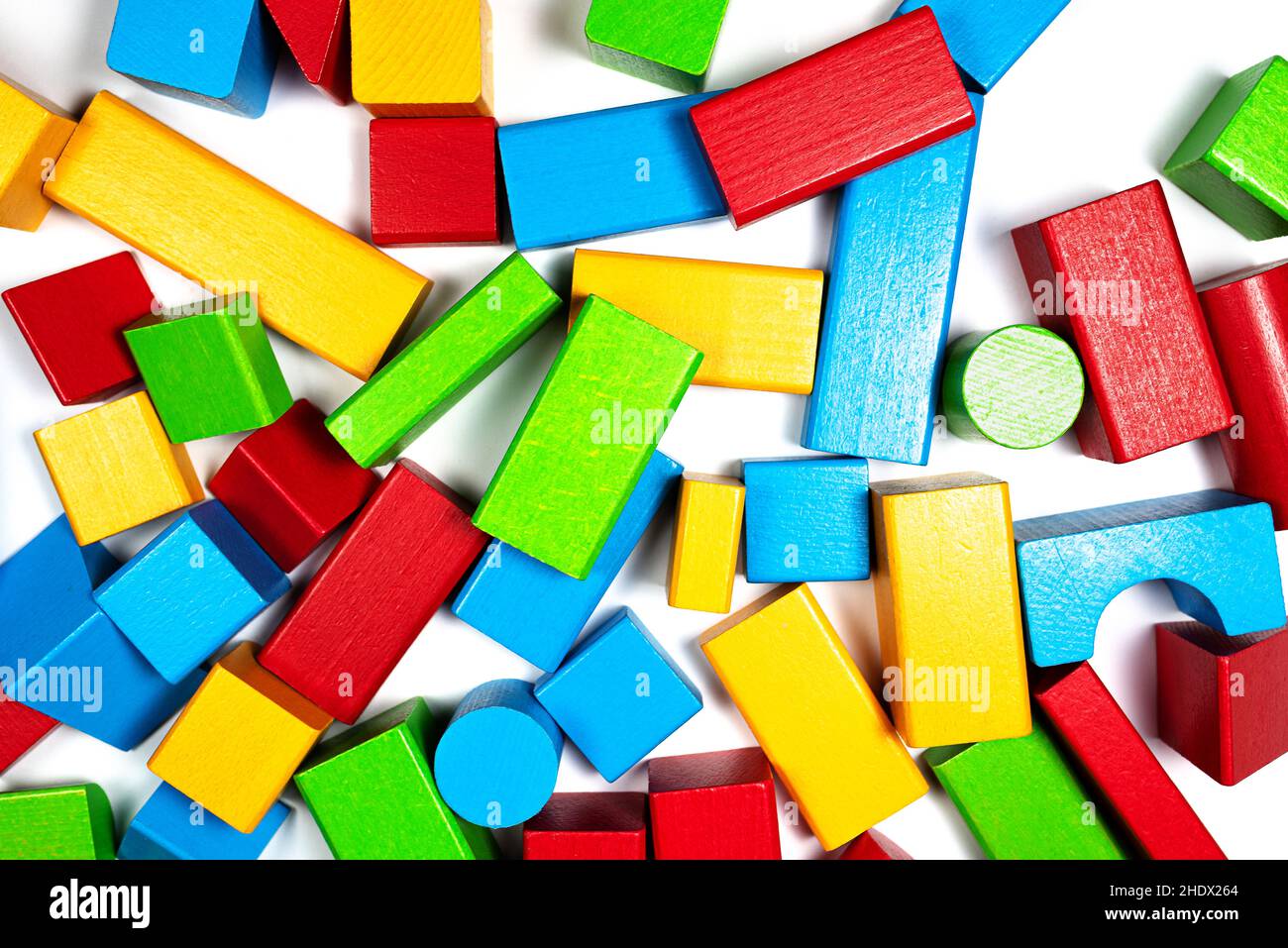 directly above view of colorful wooden toy blocks on white background Stock Photo