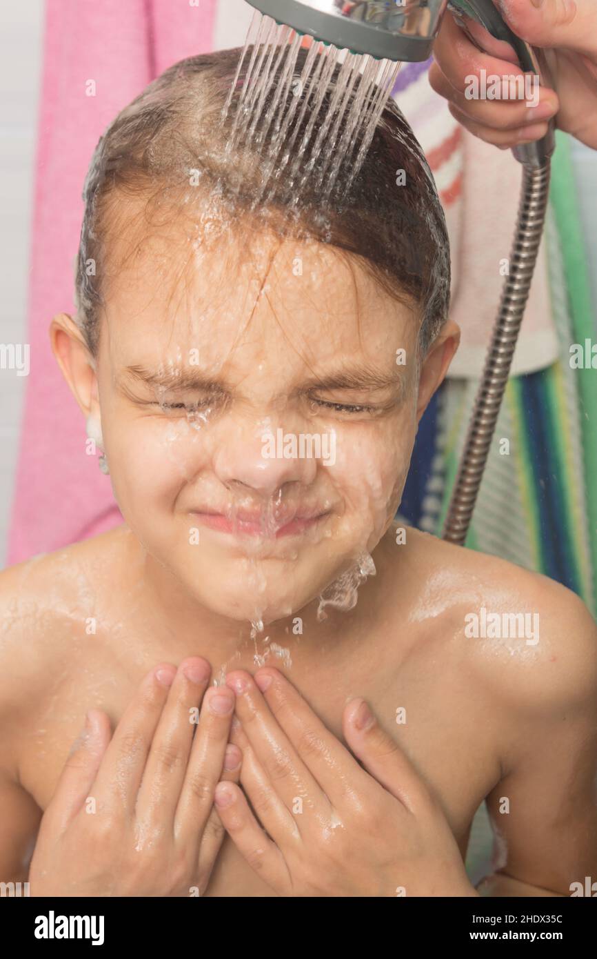 Woman wash hair middle aged hires stock photography and images Alamy
