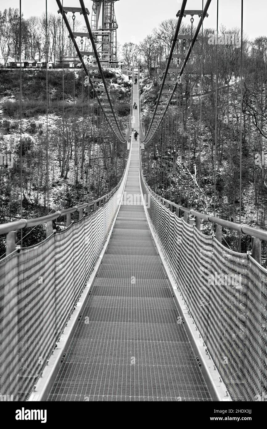 Wernigerode, Germany, December 8., 2021: Titan RT, the longest suspension bridge in the world, next to the Rappbode Dam, monchrome Stock Photo