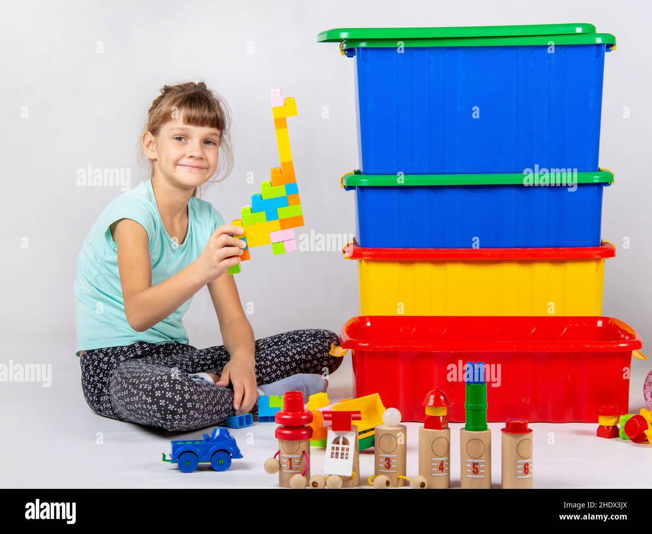 Girl playing toy girls play toys stock photo alamy