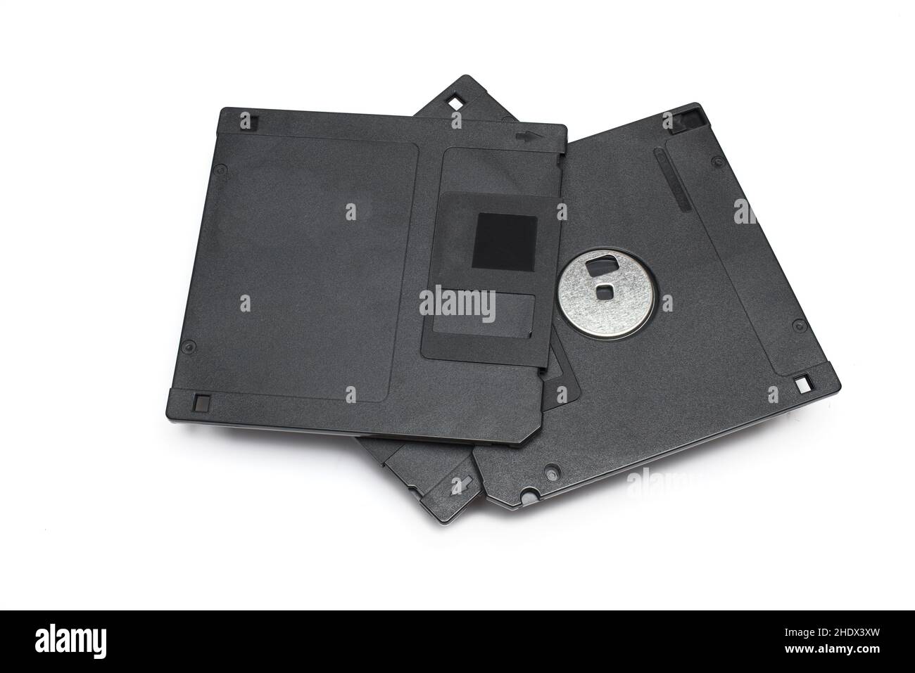 Closeup of three dot five inch high density floppy disks stacked on