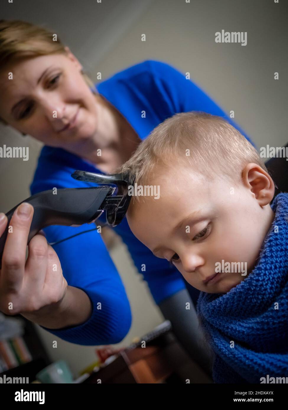 Kids haircuts hires stock photography and images Alamy