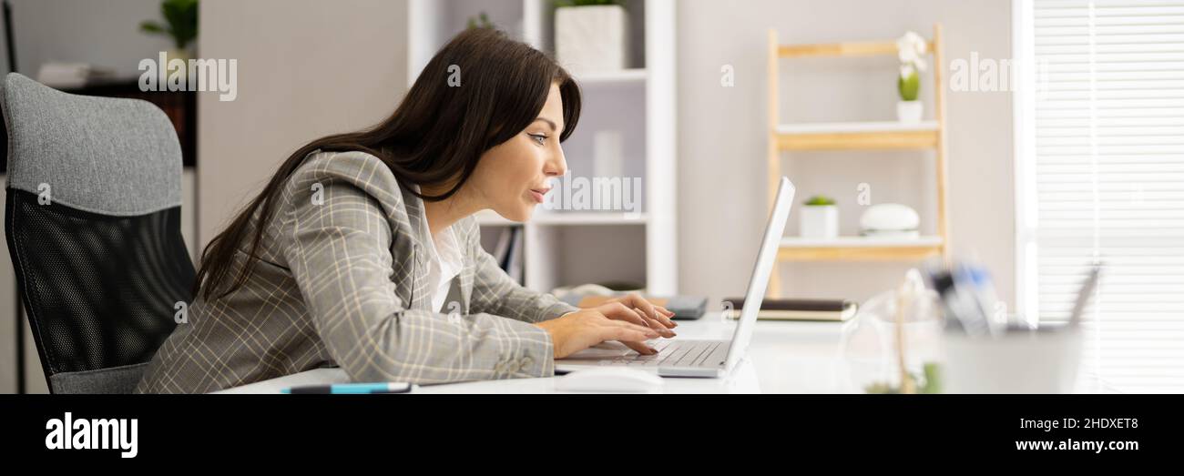 Woman Bad Posture Working Typing At Desk Stock Photo