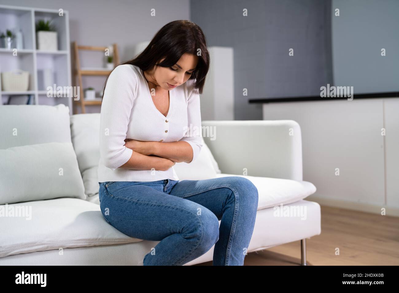 Women With Stomach Ache. Diarrhea Or PMS Pain Stock Photo Alamy