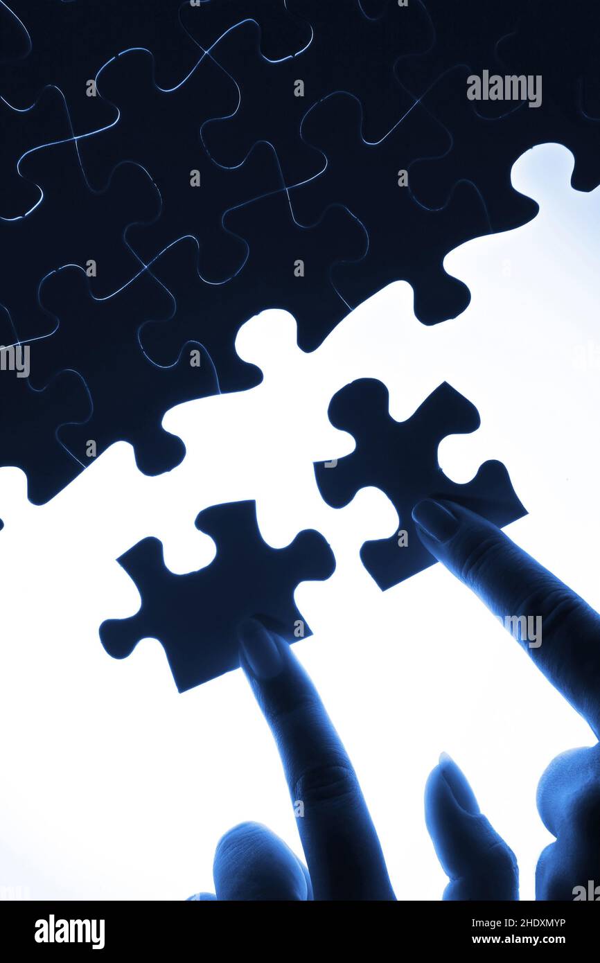 Jigsaw pieces fitting together hires stock photography and images Alamy