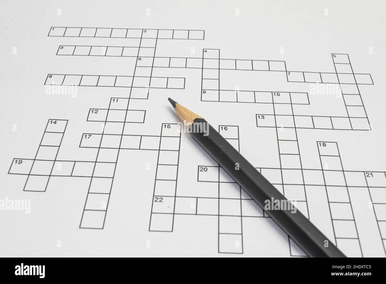 close up crossword on white background Stock Photo Alamy