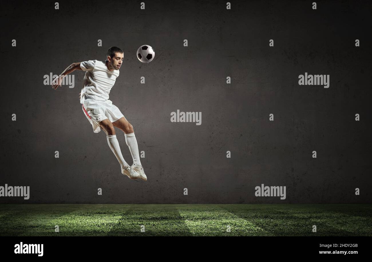 soccer player, header, kicker, kickers, soccer players, headers Stock