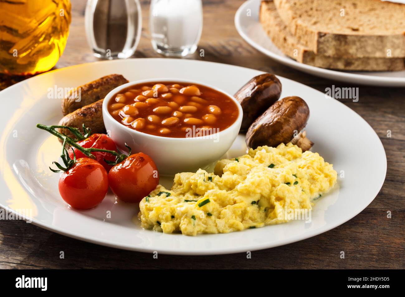 scrambled eggs, baked beans, fried sausages, fried sausage Stock Photo Alamy
