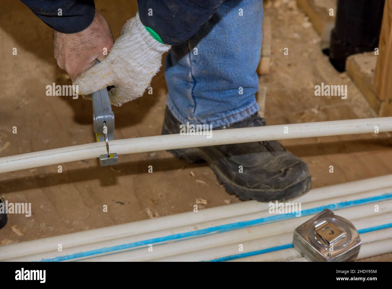 cutting, plastic pipe, pipe cutter, plastic pipes Stock Photo Alamy