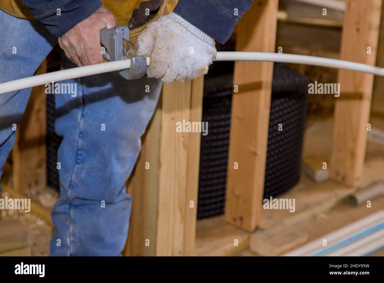 cutting, plastic pipe, pipe cutter, plastic pipes Stock Photo Alamy