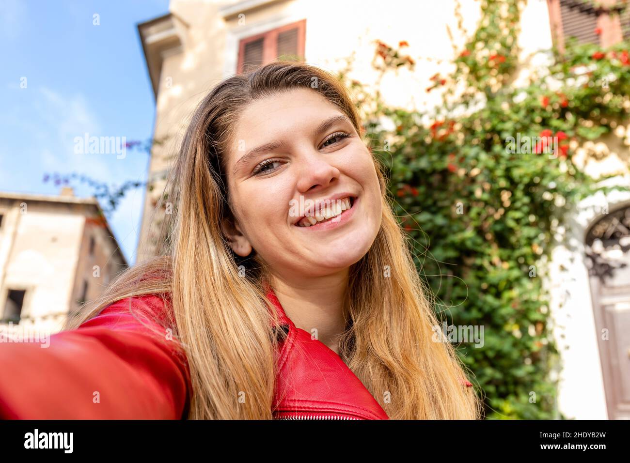 Young woman traveling to Rome. Selfie of a smiling young blond woman. Travel and freedom concept. Stock Photo