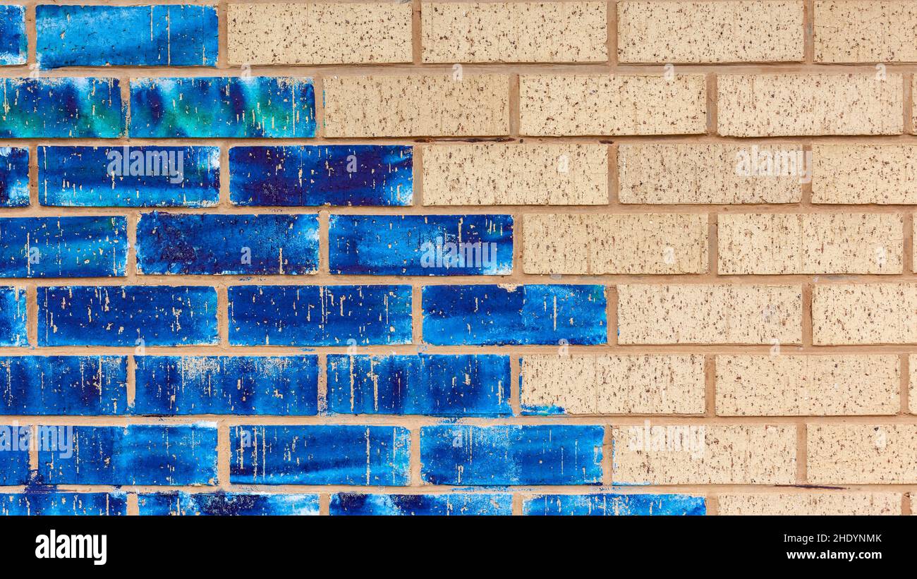 Wall closeup clay bricks plaster paint assorted of blue colors abstract