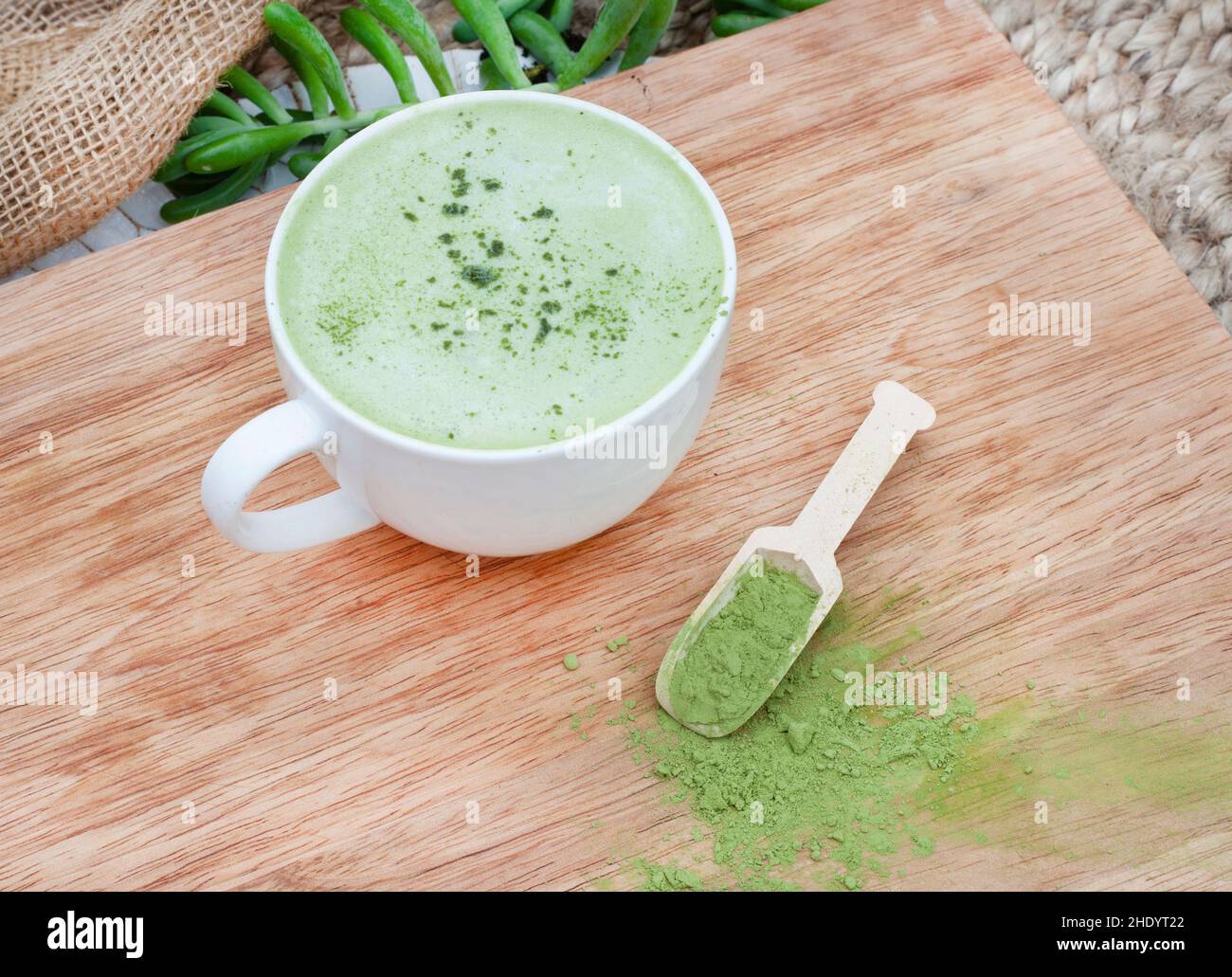 Matcha green tea latte with matcha powder Stock Photo Alamy