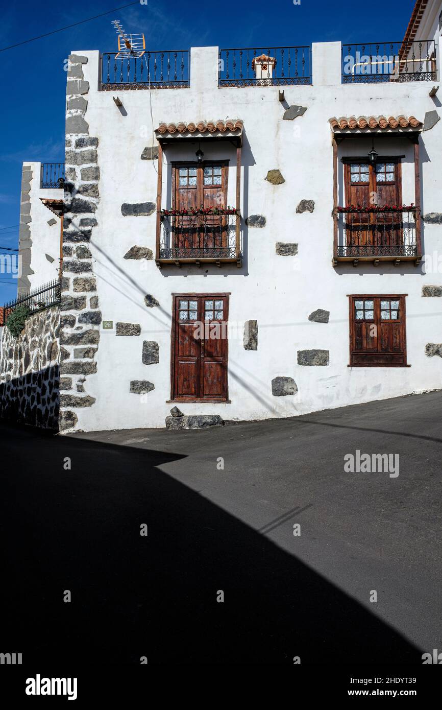 Whitewashed and stone walls of an old house in the village of Chiguergue, Guia de Isora, Tenerife, Canary Islands, Spain Stock Photo