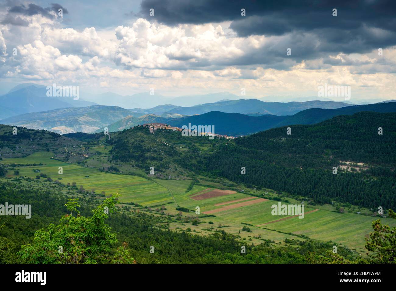 Mountain landscape at Gran Sasso Natural Park, in Abruzzo, Italy, L Aquila province, at springtime (June). View of Castelvecchio Calvisio, historic vi Stock Photo