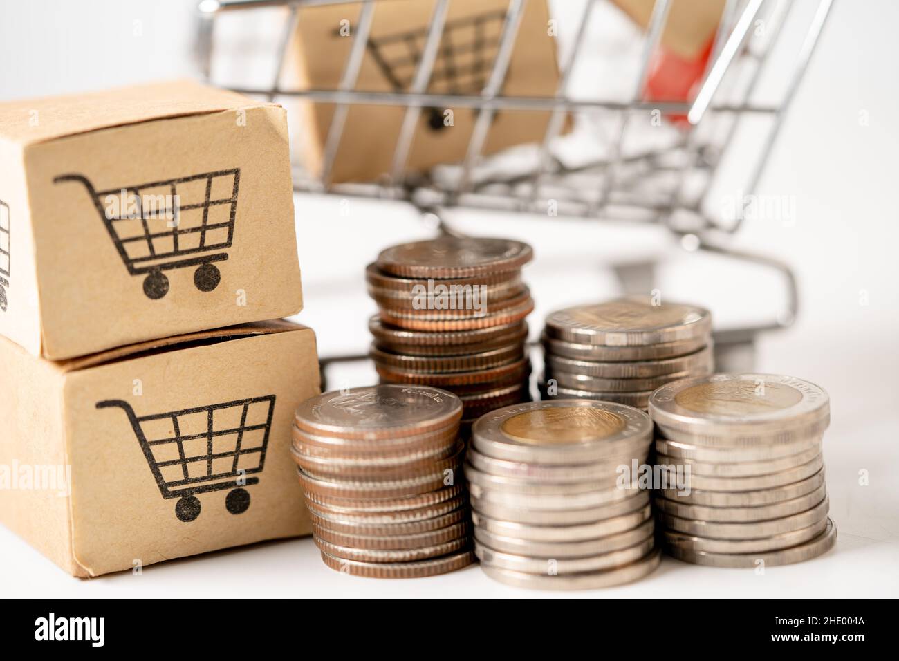 Shopping cart logo on box with coins. Banking Account, Investment Analytic research data economy, trading, Business import export online company conce Stock Photo