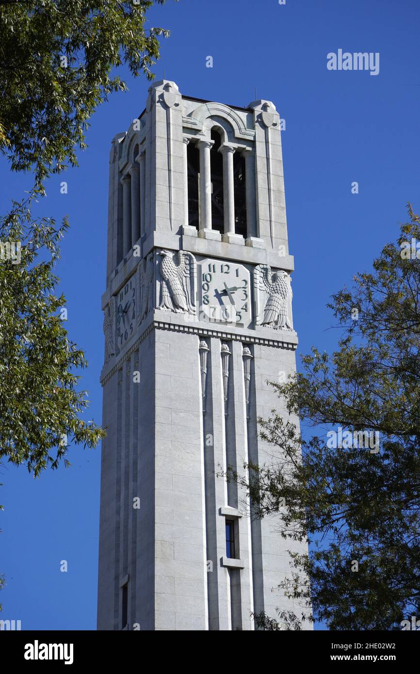 North Carolina State University Memorial Bell tower is a 115 foot tall free-standing bell tower that sits on the main campus of NCSU. Stock Photo