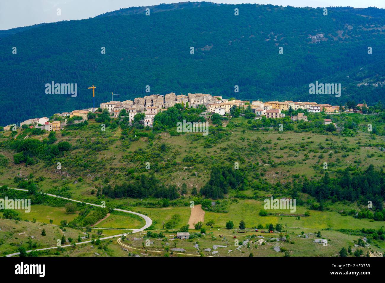 Mountain landscape at Gran Sasso Natural Park, in Abruzzo, Italy, L Aquila province, at springtime (June). View of Castelvecchio Calvisio, historic vi Stock Photo