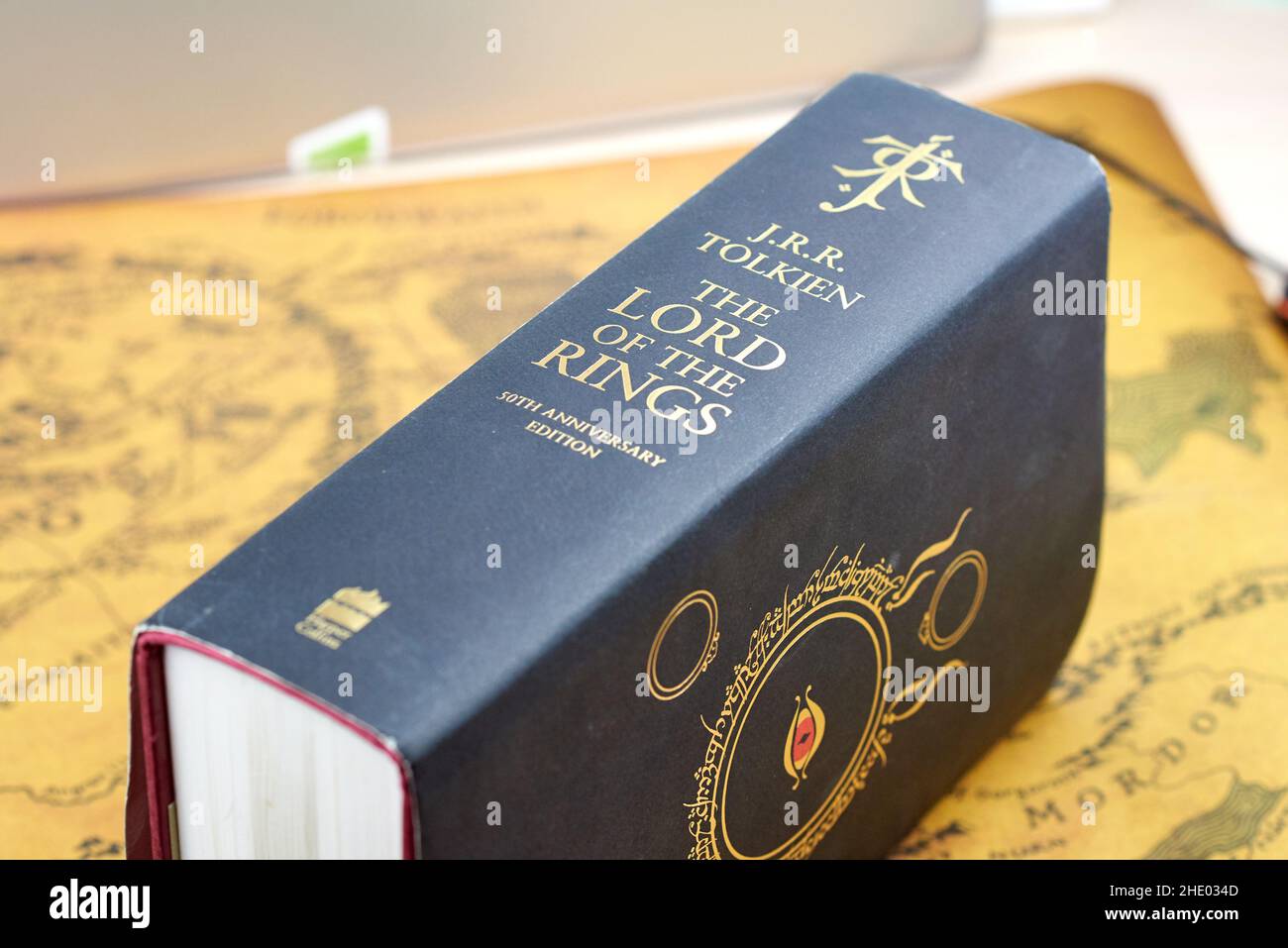 Astrakhan, Russia - 01.03.2022: Black thick Lord of the Rings book lies on Middle-Earth map Stock Photo