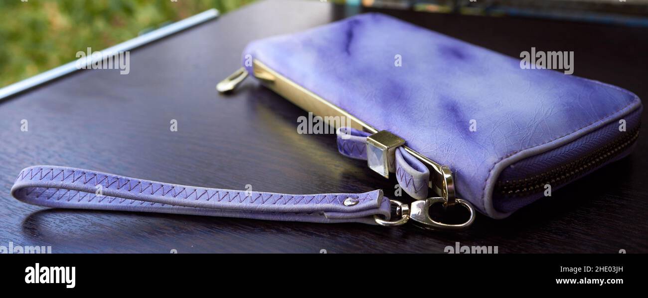 Lilac Women's Wallet with Gold Plated Rib and Strap Stock Photo