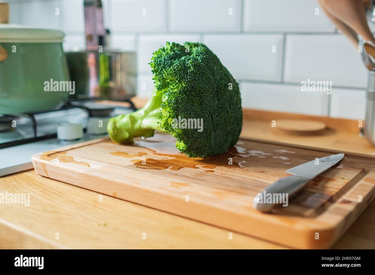 Fresh broccoli isolated on a kitchen table Stock Photo