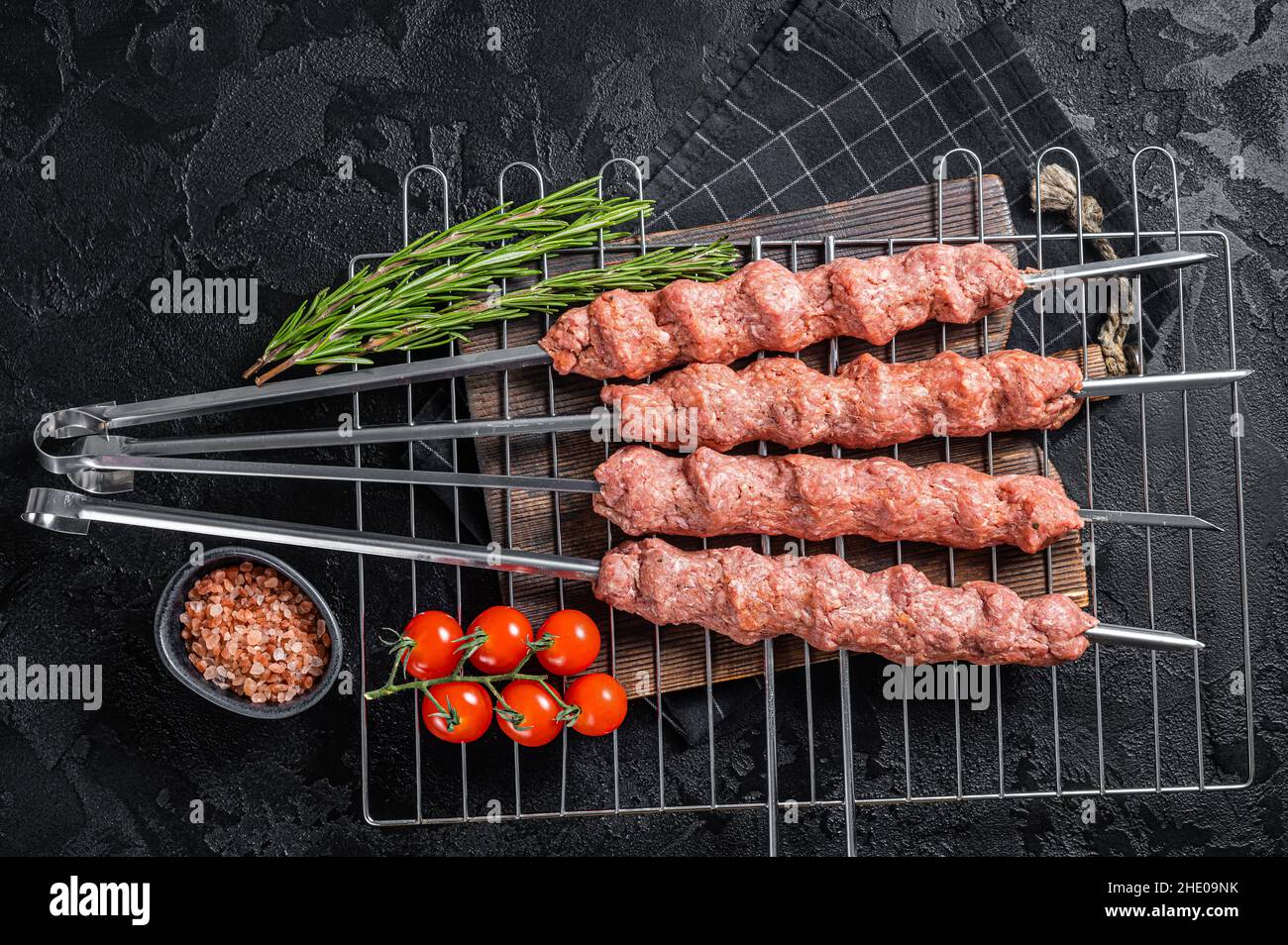 Raw Shish kebab from mince lamb and beef meat, turkish adana kebab on