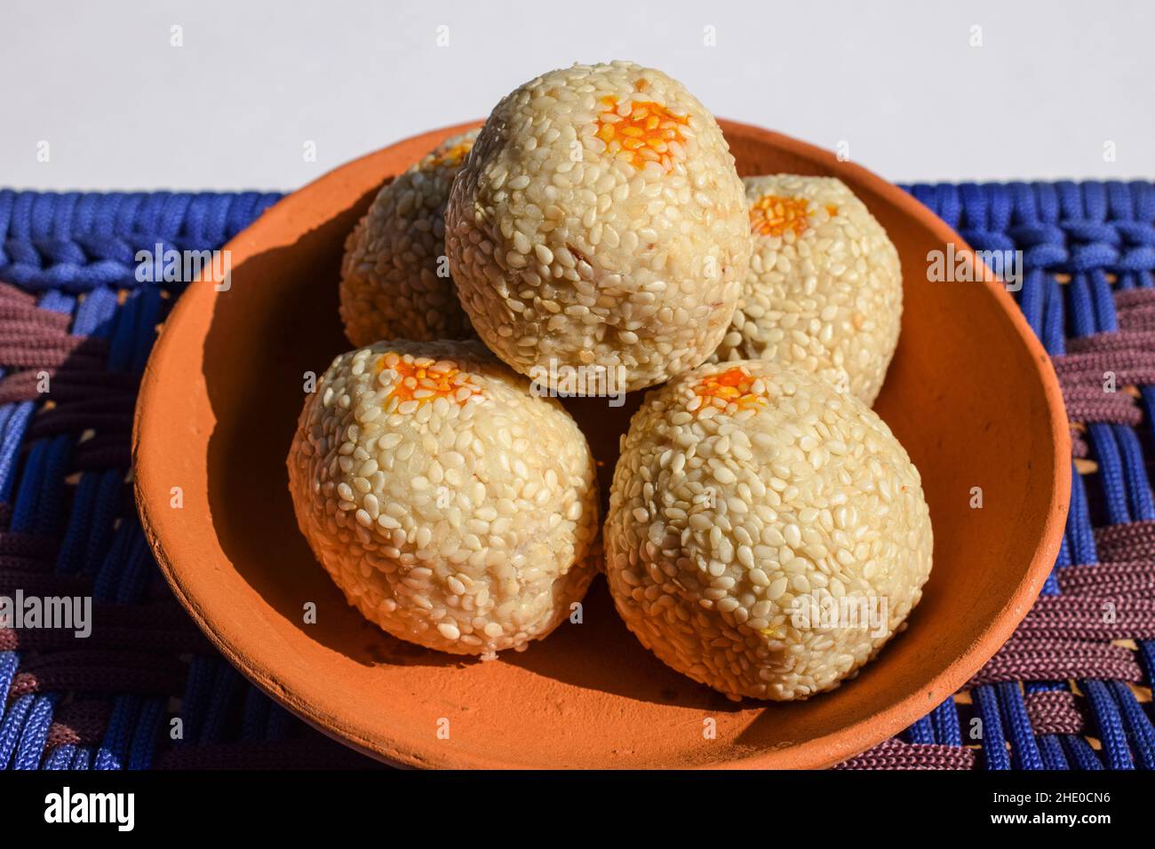 Makar Sankranti special food Tilgul ladoo recipe. white sesame seeds