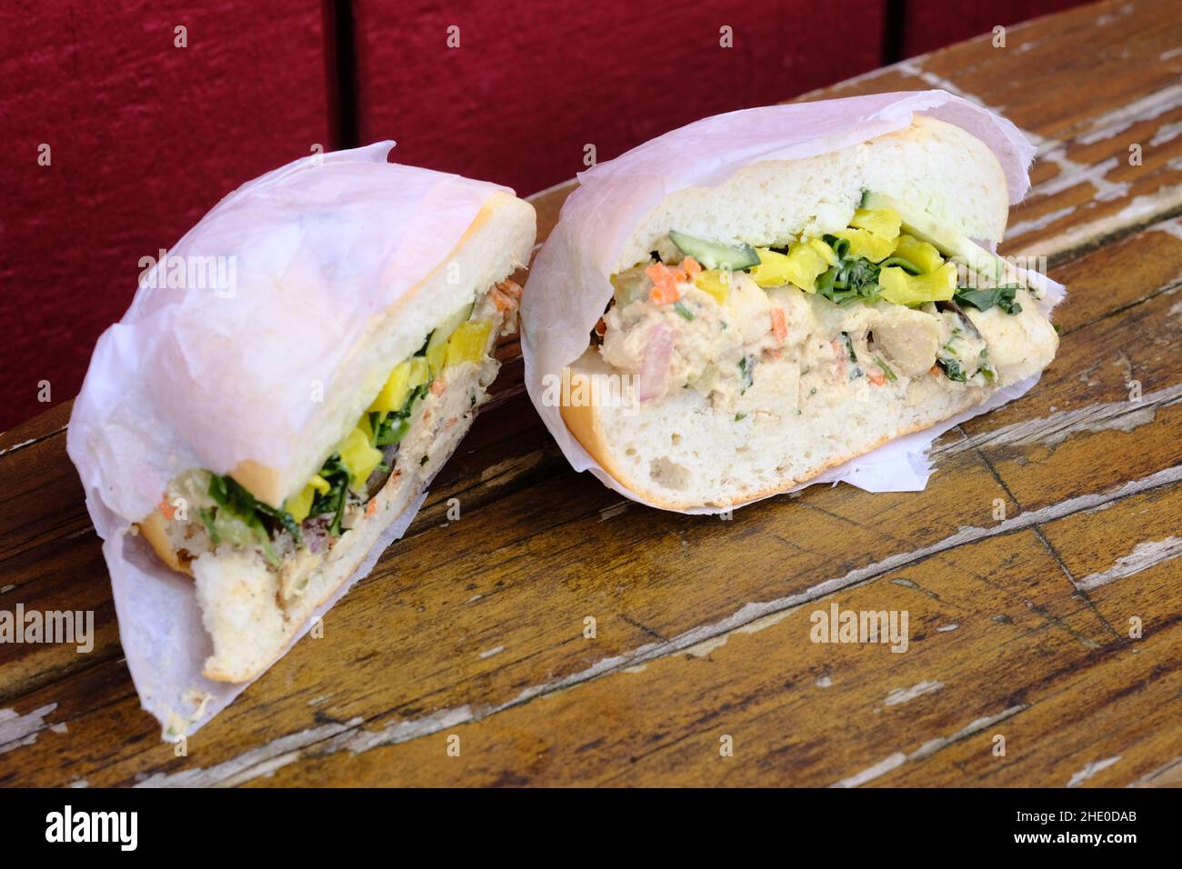 Thai chicken salad sandwich with cilantro lime dressing and banana peppers Stock Photo