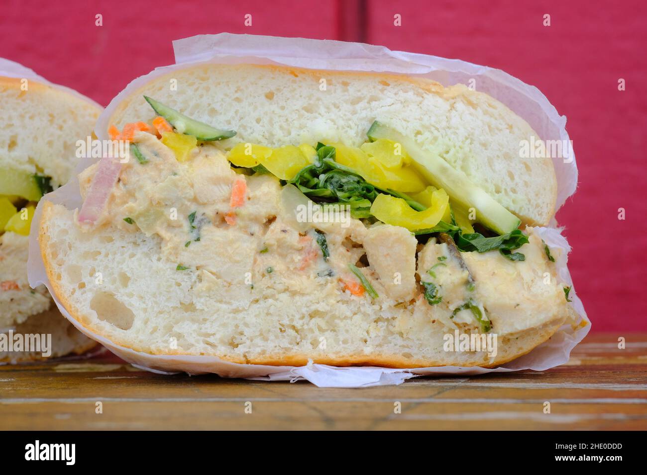 Thai chicken salad sandwich with cilantro lime dressing and banana peppers Stock Photo