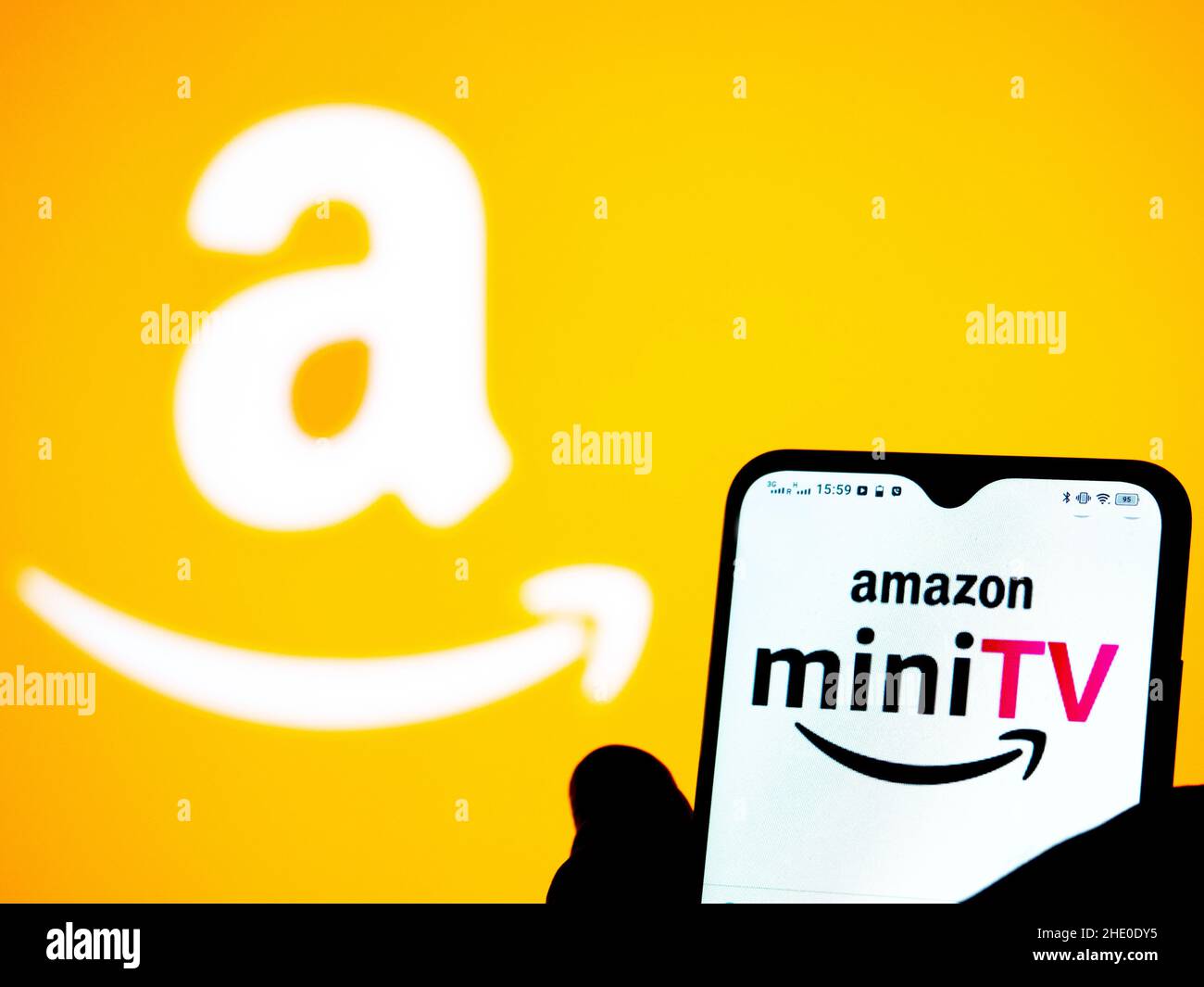 In this photo illustration an Amazon Mini TV logo seen displayed on a smartphone. Stock Photo