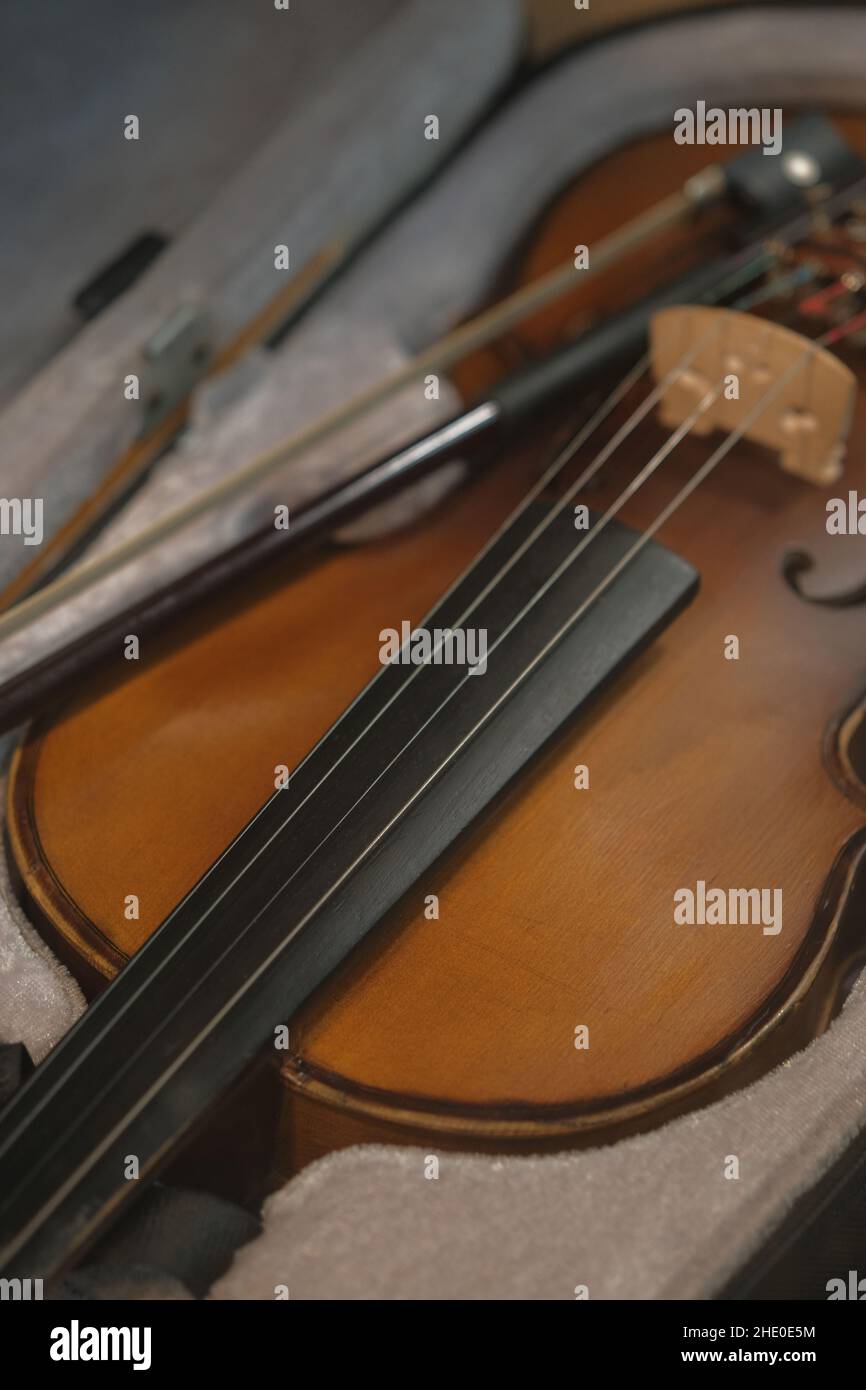 Antique classical music violin in case before concert Stock Photo