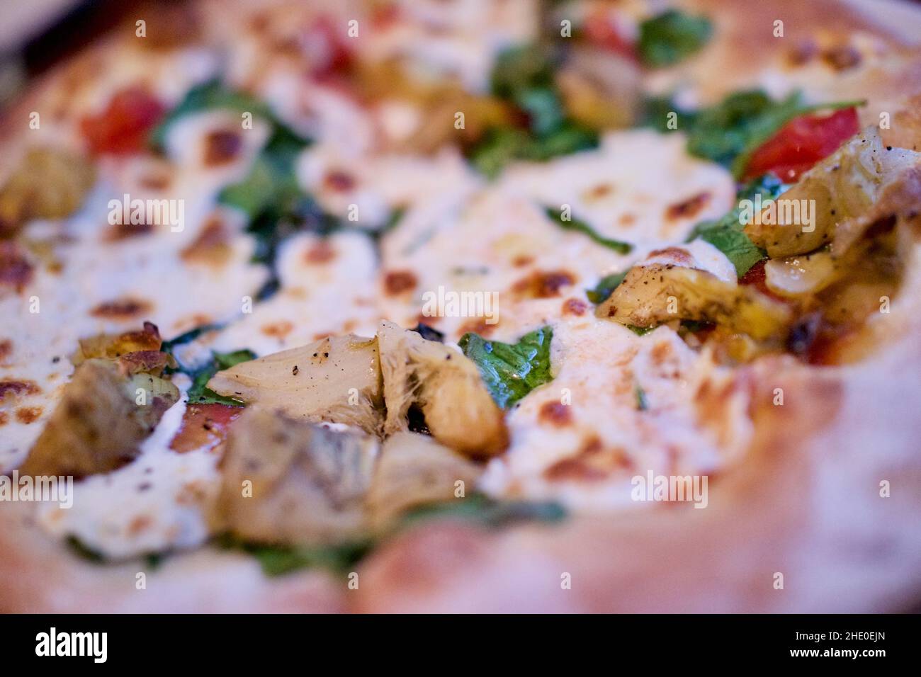 Artichoke toppings on pizza at Thomas Foolery Bar and restaurant in